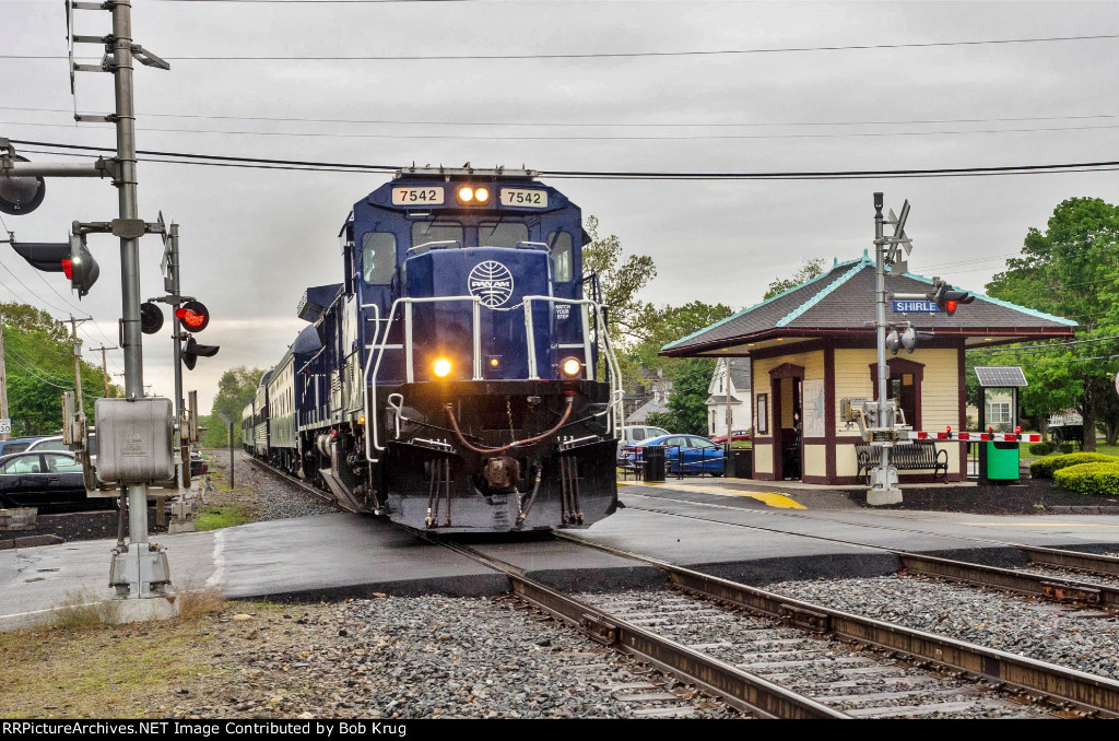 PAR 7542 leads the final Pan Am Office Car special past the MBTA commuter station in Shirley